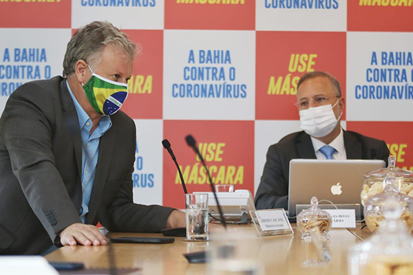 o assessor especial do ministro Eduardo Pazzuelo (Saúde), Airton Soligo, e o secretário estadual da Saúde, Fábio Vilas-Boas