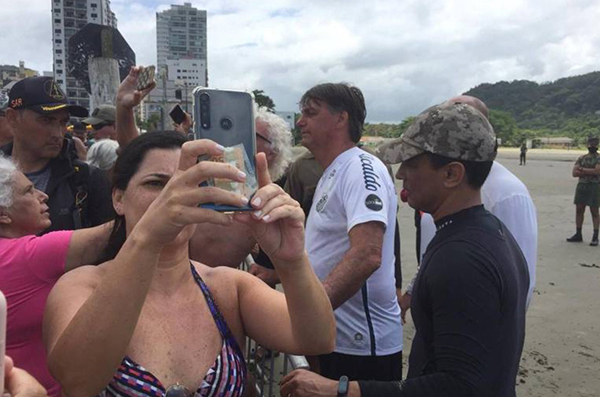 O presidente Jair Bolsonaro em Praia Grande (SP)