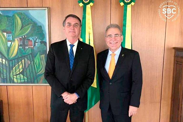 O presidente Jair Bolsonaro e o futuro ministro da Saúde, Marcelo Queiroga