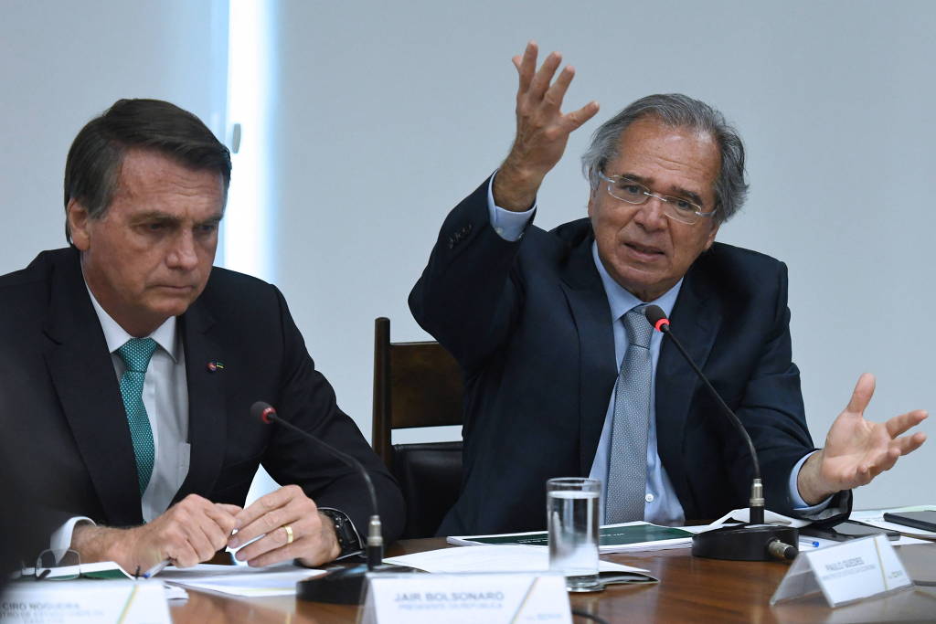 Ministro da Economia, Paulo Guedes, ao lado do presidente Jair Bolsonaro