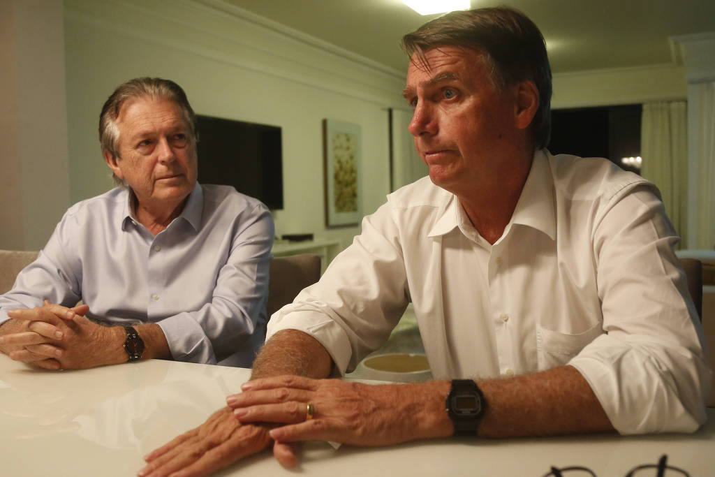 O então candidato Jair Bolsonaro e Luciano Bivar dão entrevista em janeiro de 2018, quando ainda eram aliados