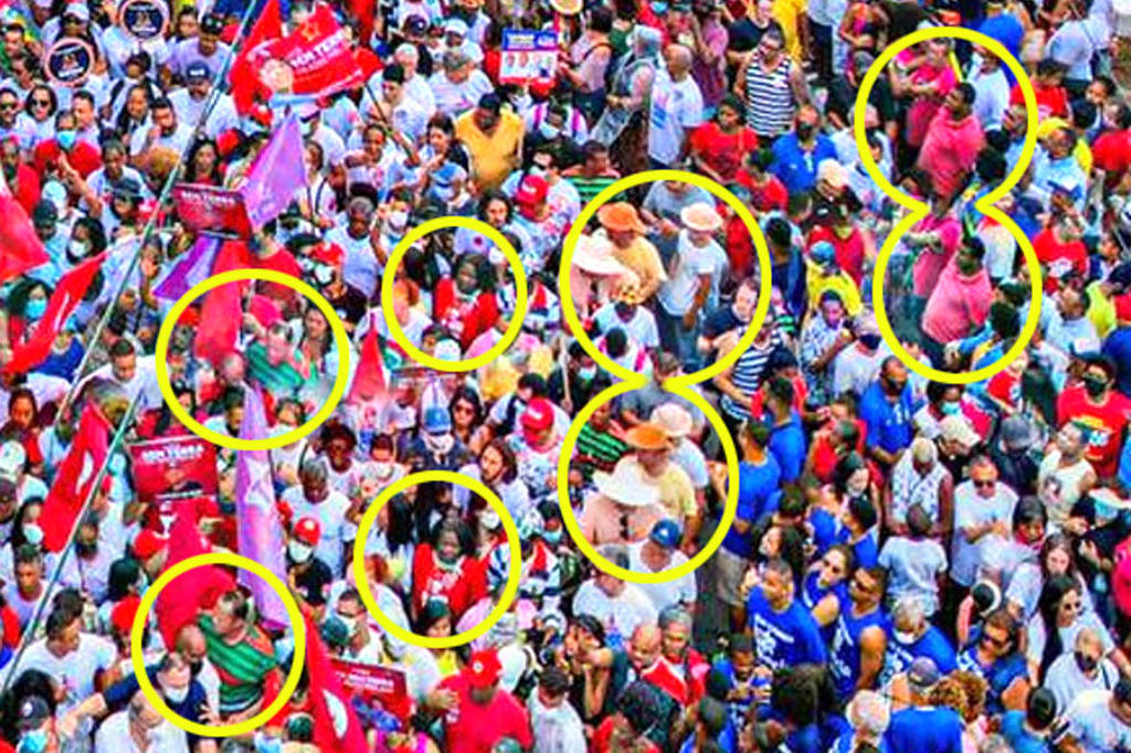 No detalhe, os apoiadores que aparecem duplicados em imagem divulgada pela campanha de Lula - No detalhe, os apoiadores que aparecem duplicados em imagem divulgada pela campanha de Lula -