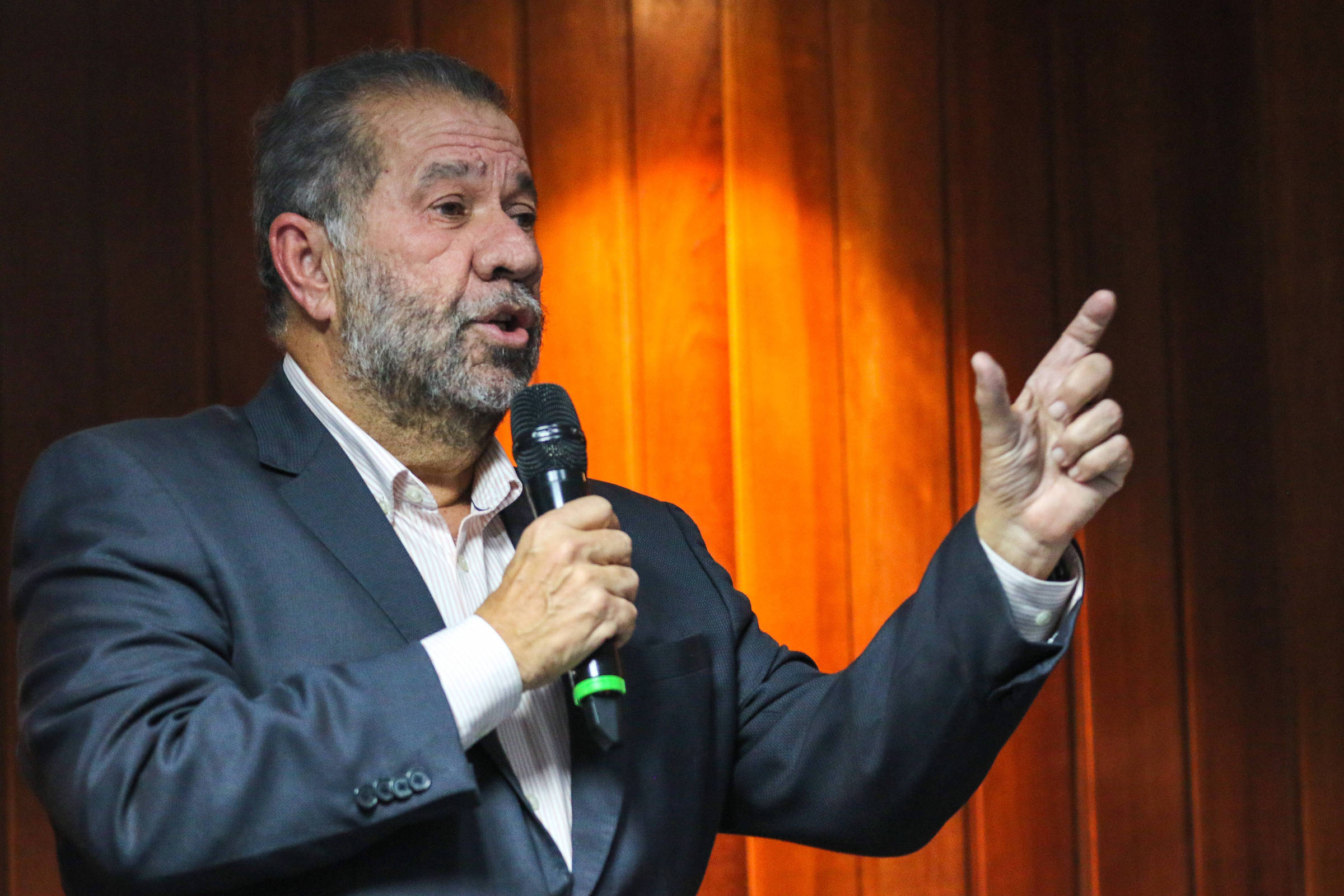 O ministro da Previdência Social, Carlos Lupi, em cerimônia para aprovados em concurso para técnico do seguro social 