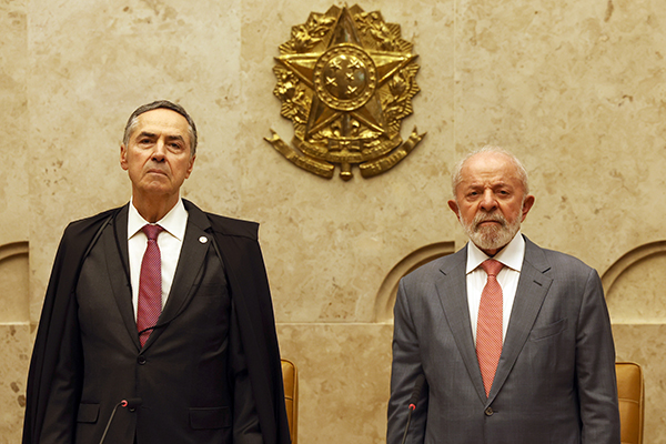 O presidente do STF, Luís Roberto Barroso e o presidente Lula (PT)